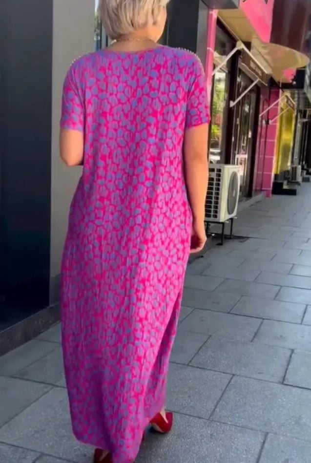 Chic Maxi Kleid mit Frühlingsmotiv Raven und praktischen Taschen