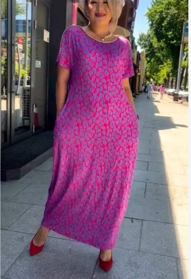 Chic Maxi Kleid mit Frühlingsmotiv Raven und praktischen Taschen