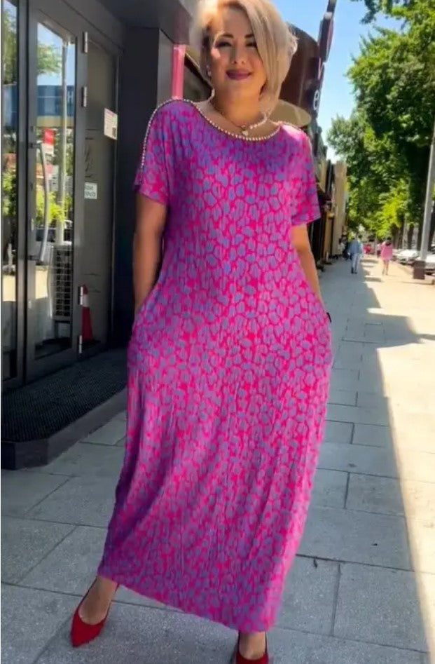 Chic Maxi Kleid mit Frühlingsmotiv Raven und praktischen Taschen
