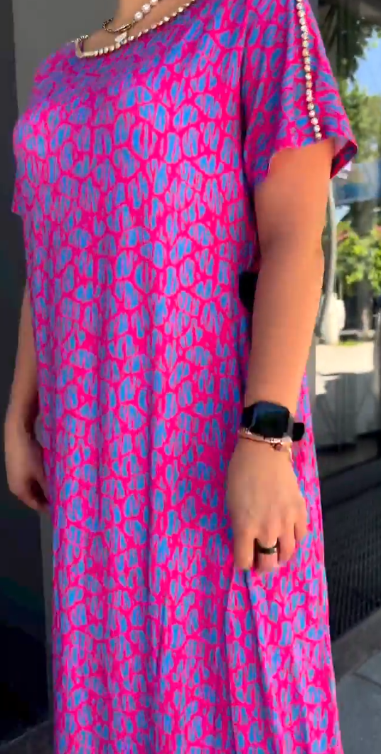 Chic Maxi Kleid mit Frühlingsmotiv Raven und praktischen Taschen