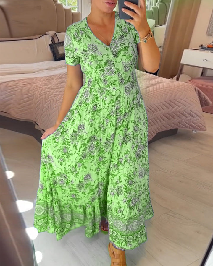 Ellie - Elegantes plissiertes V-Ausschnittkleid mit floralem Design