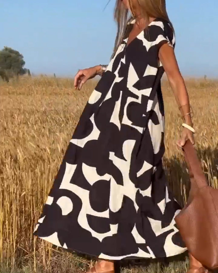 Elowen - Ärmelloses Kleid mit asymmetrischem geometrischem Design