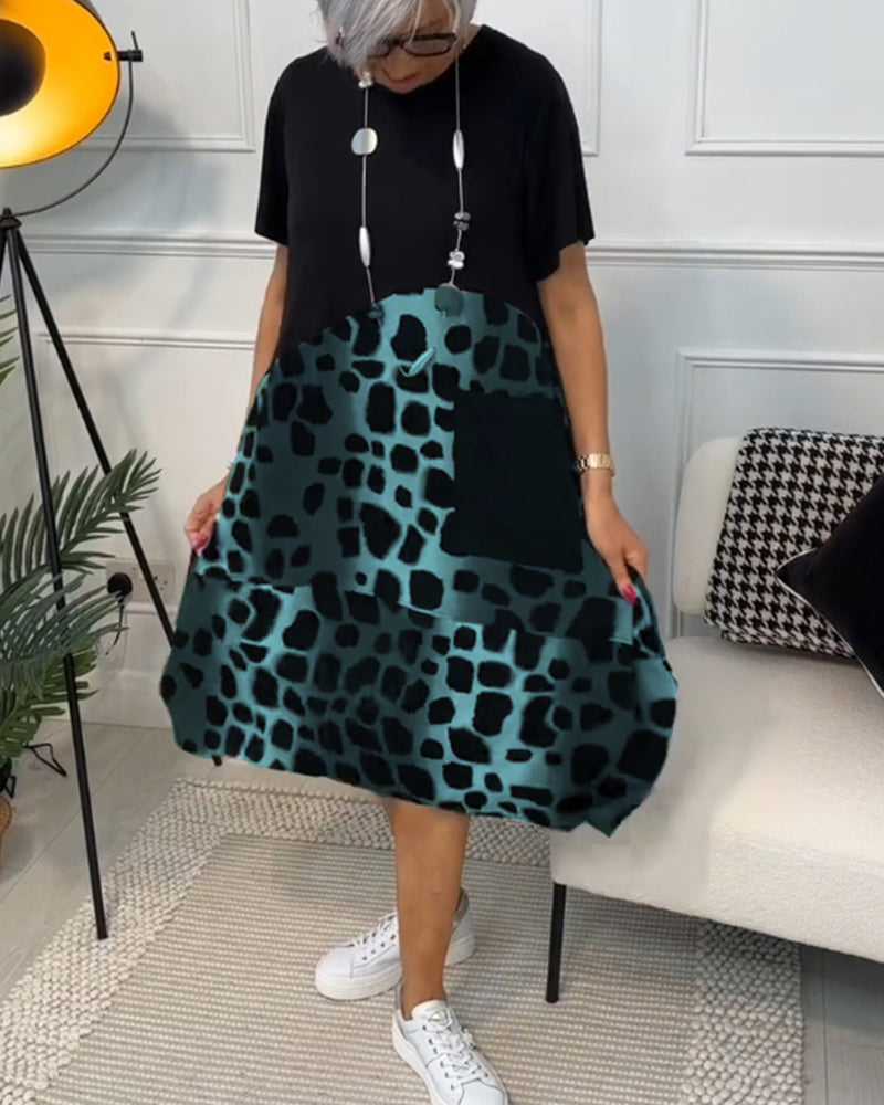 Allison - Stilvolles Midi-Kleid mit kurzen Ärmeln und Leopardenprint