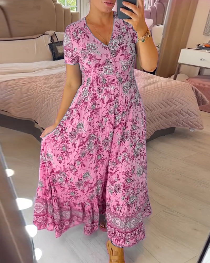 Ellie - Elegantes plissiertes V-Ausschnittkleid mit floralem Design