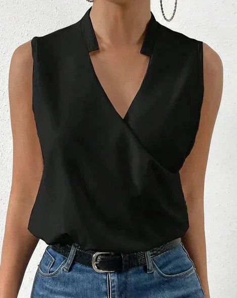 Jenna™ - Elegante Bluse" can be rewritten as "Jenna™ - Stylish Elegance Blouse.