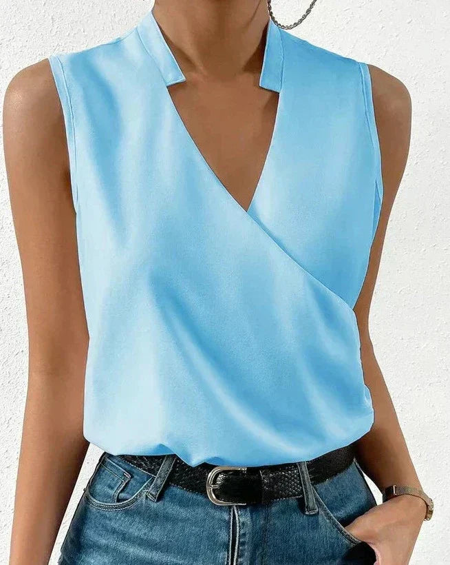 Jenna™ - Elegante Bluse" can be rewritten as "Jenna™ - Stylish Elegance Blouse.
