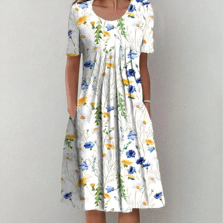 Leilani - Rüschendes Abendkleid im Sommerblüten-Design