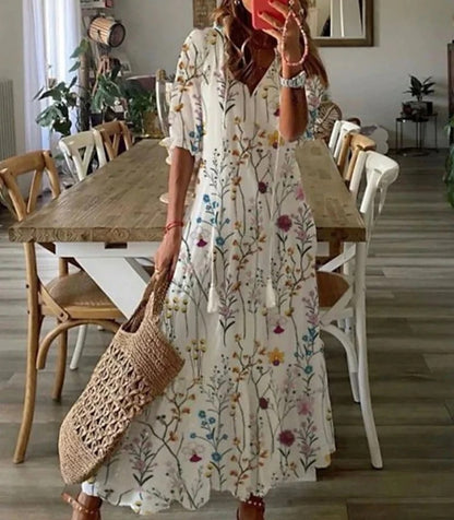 Sophia - Vintage Boho Sommerkleid mit V-Ausschnitt" can be rewritten as:

"Sophia - Bohemian Vintage Sommerkleid mit V-Ausschnitt