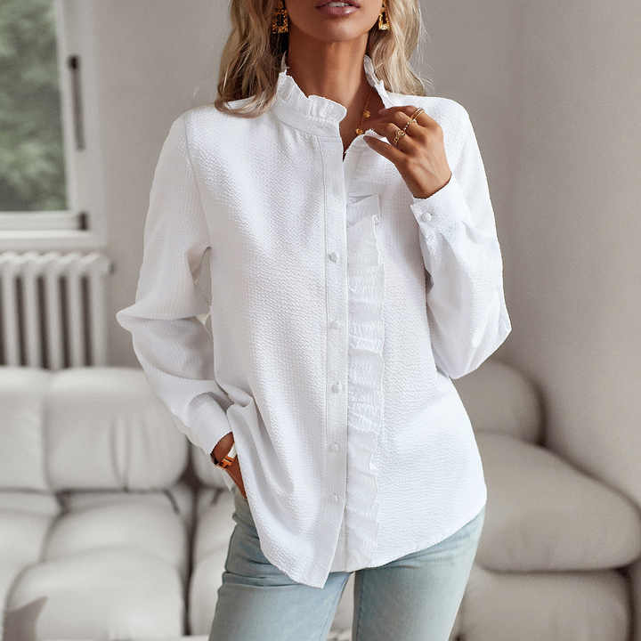 "Belle™ - Elegante Polo-Bluse" can be rewritten as "Belle™ - Chic Polo Blouse".